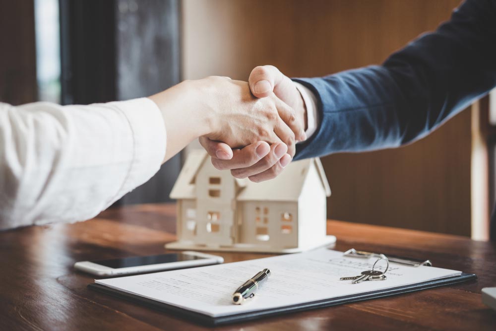 Handshake With A Property Manager